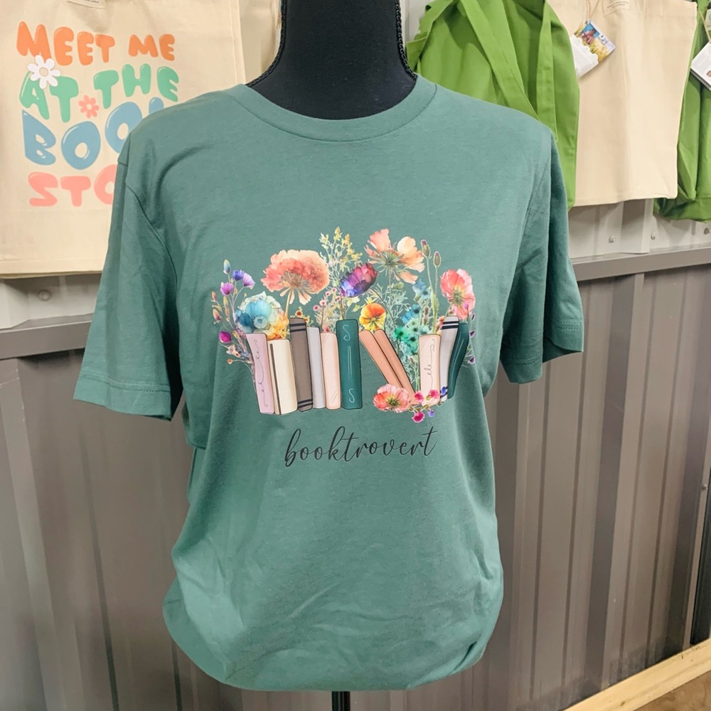 NWOT Green Graphic Tee with Floral Book Design